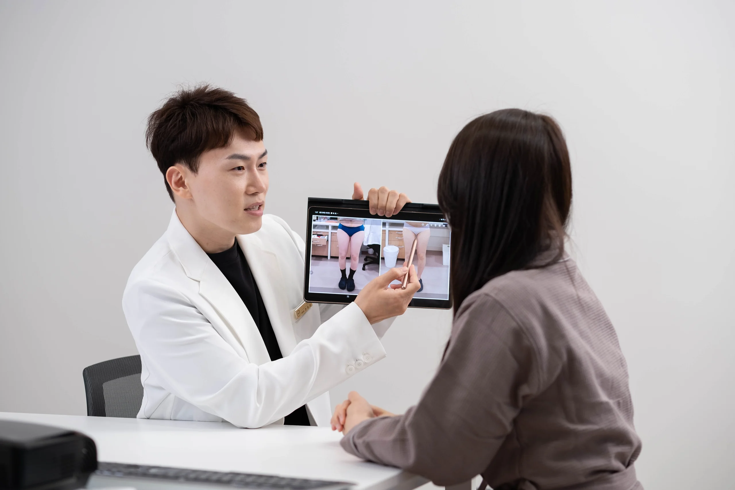 Eraser doctor interacting with a patient in a consultation scene